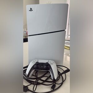 Playstation 5 Slim Console with matching controller.